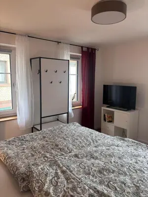 Ein Bett oder Betten in einem Zimmer der Unterkunft s' Kännele Ferienwohnungen