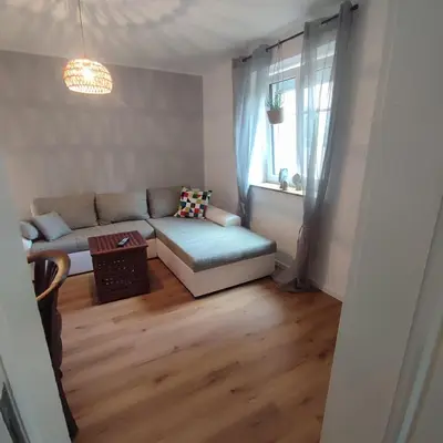 Ein Bett oder Betten in einem Zimmer der Unterkunft s' Kännele Ferienwohnungen