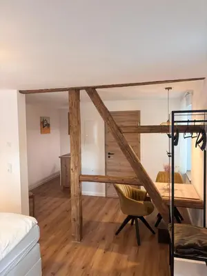 Ein Bett oder Betten in einem Zimmer der Unterkunft s' Kännele Ferienwohnungen