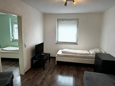 Ein Bett oder Betten in einem Zimmer der Unterkunft Apartment Aschaffenburg