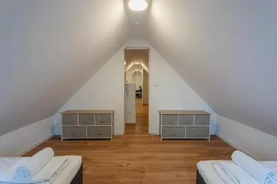 Ein Bett oder Betten in einem Zimmer der Unterkunft G-Living - Theodor Heuss Str