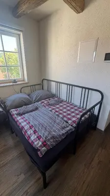 Ein Bett oder Betten in einem Zimmer der Unterkunft Gästezimmer in Großbottwar Zentrum