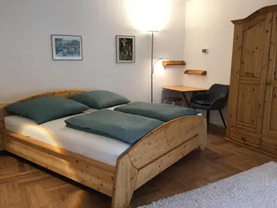 Ein Bett oder Betten in einem Zimmer der Unterkunft Ferienwohnung Laudenbach