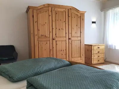 Ein Bett oder Betten in einem Zimmer der Unterkunft Ferienwohnung Laudenbach