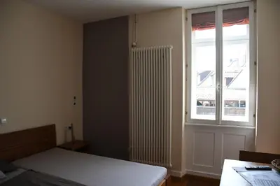 Ein Bett oder Betten in einem Zimmer der Unterkunft Gästehaus stuttgART36