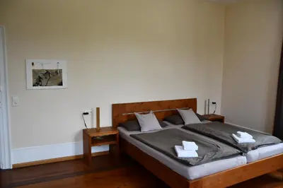 Ein Bett oder Betten in einem Zimmer der Unterkunft Gästehaus stuttgART36