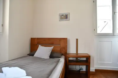Ein Bett oder Betten in einem Zimmer der Unterkunft Gästehaus stuttgART36