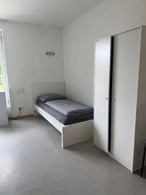 Ein Bett oder Betten in einem Zimmer der Unterkunft R&R Apartments - Boardinghouse