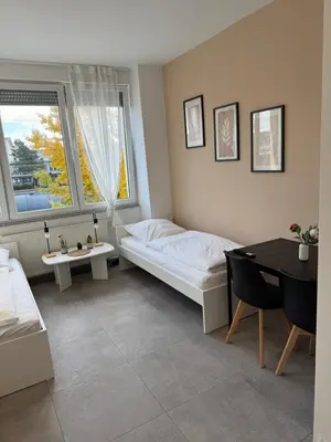 Ein Bett oder Betten in einem Zimmer der Unterkunft Ok Apartments
