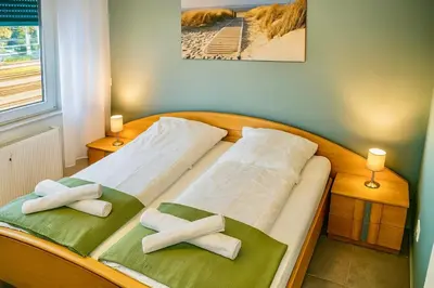 Ein Bett oder Betten in einem Zimmer der Unterkunft Ok Apartments