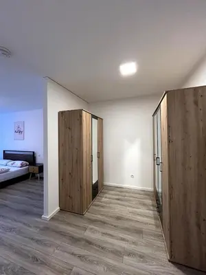 Ein Bett oder Betten in einem Zimmer der Unterkunft Nur 9 Min zu Fuß ins Zentrum I Balkon I Netflix