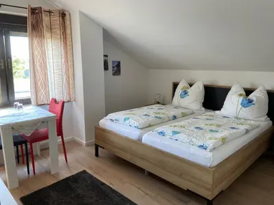 Ein Bett oder Betten in einem Zimmer der Unterkunft Pension Casa Rosa