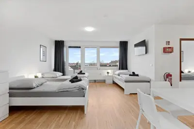 Ein Bett oder Betten in einem Zimmer der Unterkunft MONTEUR - Unterkunft für bis zu 5 Personen in 64546 Mörfelden-Walldorf - GG11