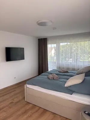 Ein Bett oder Betten in einem Zimmer der Unterkunft Pension Keck