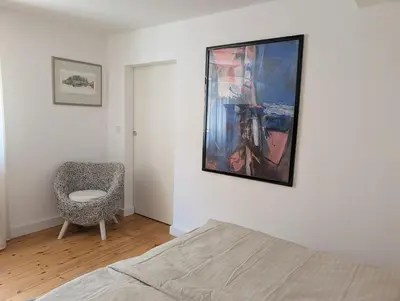 Ein Bett oder Betten in einem Zimmer der Unterkunft Ferienhaus Lisette Wohlfühldomizil zwischen Rebenmeer und Pfälzer Wald