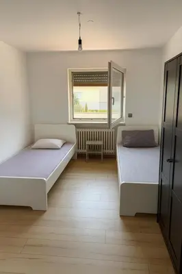 Ein Bett oder Betten in einem Zimmer der Unterkunft Monteur- und Ferienwohnung Rheinhausen - Lönsweg