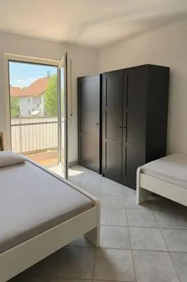Ein Bett oder Betten in einem Zimmer der Unterkunft Monteur- und Ferienwohnung Rheinhausen - Lönsweg