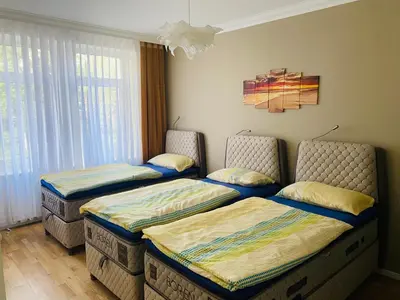 Ein Bett oder Betten in einem Zimmer der Unterkunft InterAssist 2