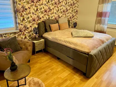 Ein Bett oder Betten in einem Zimmer der Unterkunft Ferienwohnung Schwegenheim 