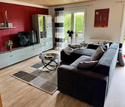 Ein Sitzbereich in der Unterkunft Ferienwohnung Schwegenheim 