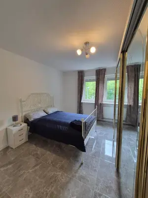 Ein Bett oder Betten in einem Zimmer der Unterkunft Tami