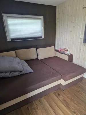 Ein Sitzbereich in der Unterkunft Tiny House Urlaub Übernachtung