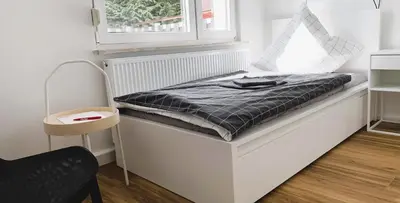 Ein Bett oder Betten in einem Zimmer der Unterkunft ZeitRaum Apartments Heilbronn