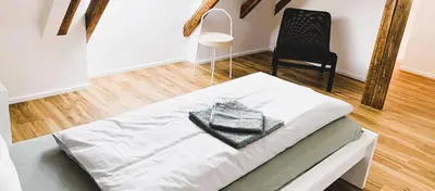 Ein Bett oder Betten in einem Zimmer der Unterkunft ZeitRaum Apartments Heilbronn