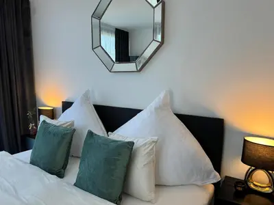 Ein Bett oder Betten in einem Zimmer der Unterkunft Karlsruhe Finest Apartment 2