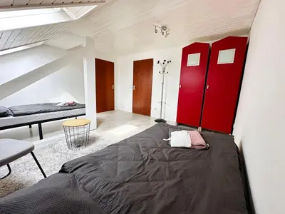 Ein Bett oder Betten in einem Zimmer der Unterkunft Comfort Stay Apartment in Rüsselsheim am Main