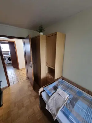 Ein Bett oder Betten in einem Zimmer der Unterkunft TK Appartement