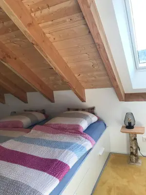 Ein Bett oder Betten in einem Zimmer der Unterkunft Blockhaus in herrlicher Umgebung