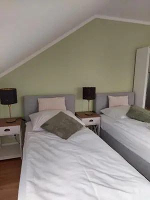 Ein Bett oder Betten in einem Zimmer der Unterkunft Apartment Senfnest