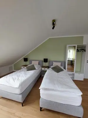 Ein Bett oder Betten in einem Zimmer der Unterkunft Apartment Senfnest
