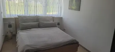 Ein Bett oder Betten in einem Zimmer der Unterkunft Ferienhaus Schmidt
