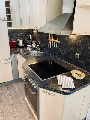 Küche/Küchenzeile in der Unterkunft Belisima Apartments I Ferienwohnung Ruppertsberg R03 - Reiterpfad I separater Schlafbereich mit Boxspringbetten I Waschmaschine I Parkplatz I Nähe Supermarkt - Bäcker - Bahnhof