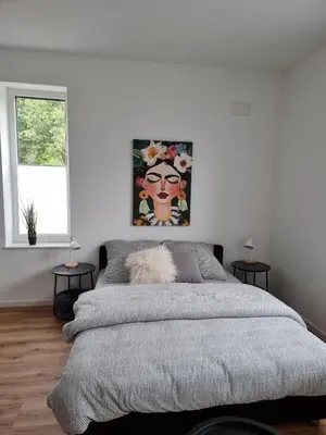 Ein Bett oder Betten in einem Zimmer der Unterkunft 1-Zimmer-Loft Casa Frida
