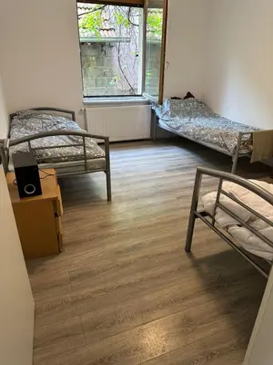 Ein Bett oder Betten in einem Zimmer der Unterkunft Ferienwohnung LU