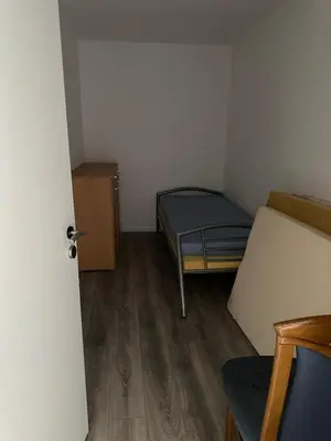 Ein Bett oder Betten in einem Zimmer der Unterkunft Ferienwohnung LU