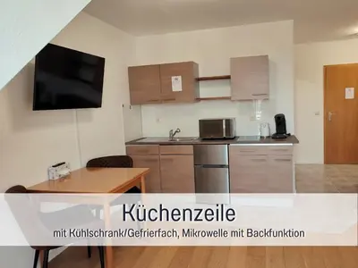 Küche/Küchenzeile in der Unterkunft City-Apartment Germersheim