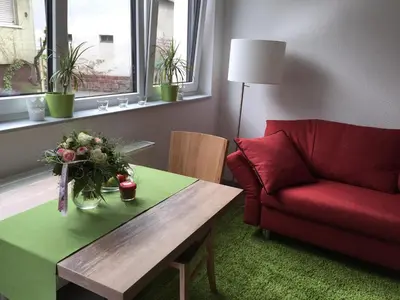 Ein Sitzbereich in der Unterkunft Ferienwohnung Wassergasse