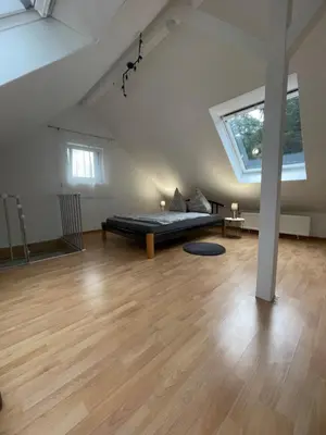 Ein Bett oder Betten in einem Zimmer der Unterkunft Ferienwohnung Albstern