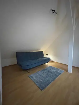 Ein Sitzbereich in der Unterkunft Ferienwohnung Albstern