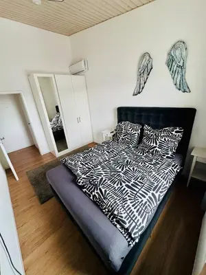 Ein Bett oder Betten in einem Zimmer der Unterkunft Stylish 3-room apartment, centrally located