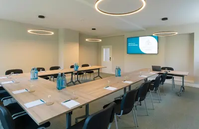Der Geschäftsbereich oder Konferenzraum in der Unterkunft Wohnpark Hotel Heppenheim