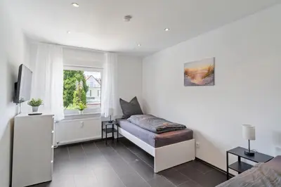 Ein Bett oder Betten in einem Zimmer der Unterkunft RU02 Wohnung in der Opelstadt!
