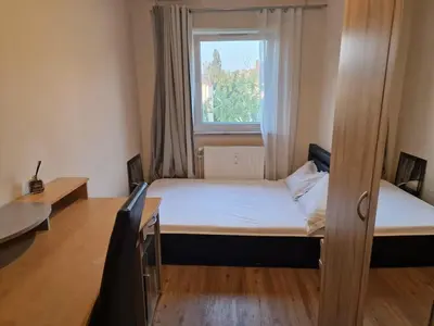 Ein Bett oder Betten in einem Zimmer der Unterkunft Nyadjam Casa