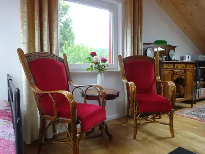 Ein Sitzbereich in der Unterkunft Ferienwohnung Zeitlos