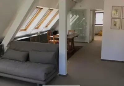 Ein Sitzbereich in der Unterkunft Exklusive Maisonettewohnung