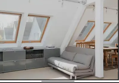 Ein Sitzbereich in der Unterkunft Exklusive Maisonettewohnung